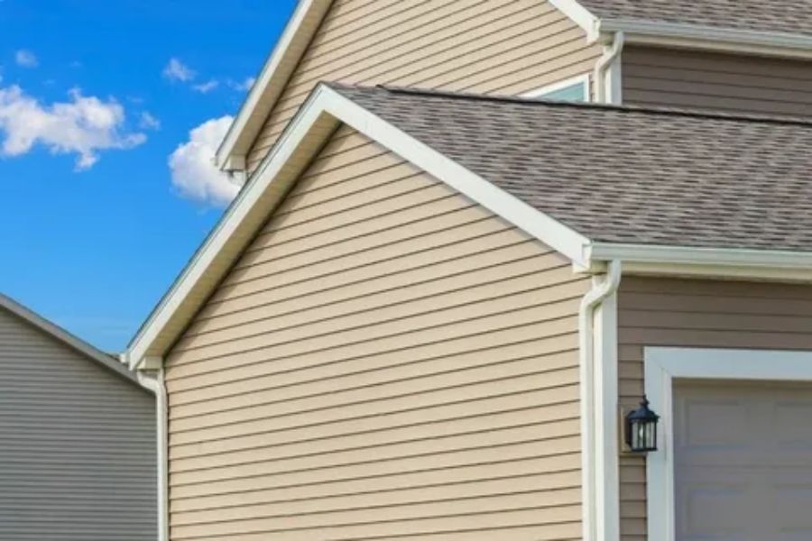 Which is cheaper wood or vinyl siding?